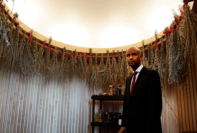 Minister Hussen in the medicine room, a space for relatives to meet with the on-site cultural mentor and to practice healing.