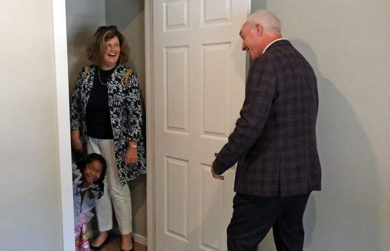Julia Deans, Habitat for Humanity and Glenn Furlong, CMHC join
                  Jodielynn’s daughter in her new room.