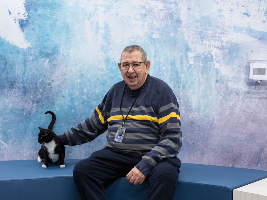 Robert, pictured here with Grace Village’s resident cat, has a new home at the Salvation Army’s new state-of-the-art development in Edmonton.