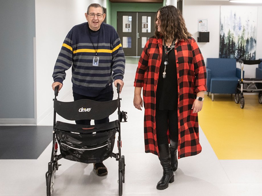 Robert enjoys the supports and activities that Grace Village offers such as games night and going to the gym. L to R: Robert and Vanessa Simm, assistant executive director, Salvation Army, Centre of Hope.