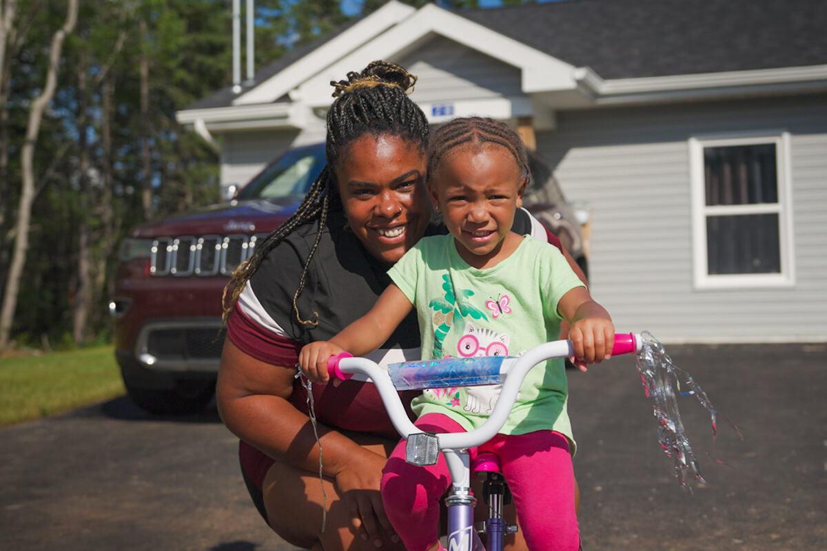 Thanks to her new home, Jontelle is able to put money aside for her family's future.