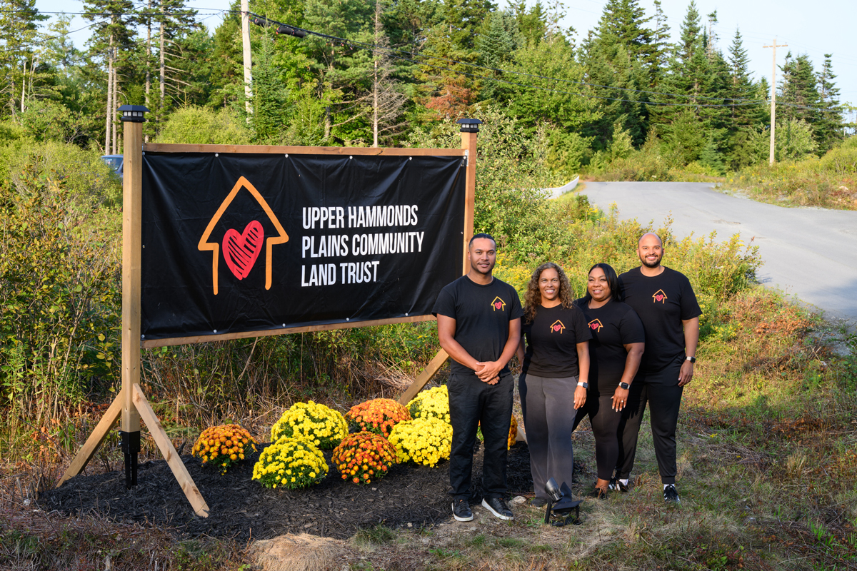 Curtis Whiley (far right) created the Upper Hammonds Plains Community Land Trust to preserve and protect the community of Upper Hammonds Plains. Together with board members Karalee Oliver (second from right), Melisa Marsman (third from right) and Brandon David (left), he is honouring the legacy of his ancestors and building a sustainable future.